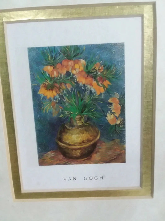 Framed artwork of a still life with flowers and a vase, signed 'Van Gogh'.