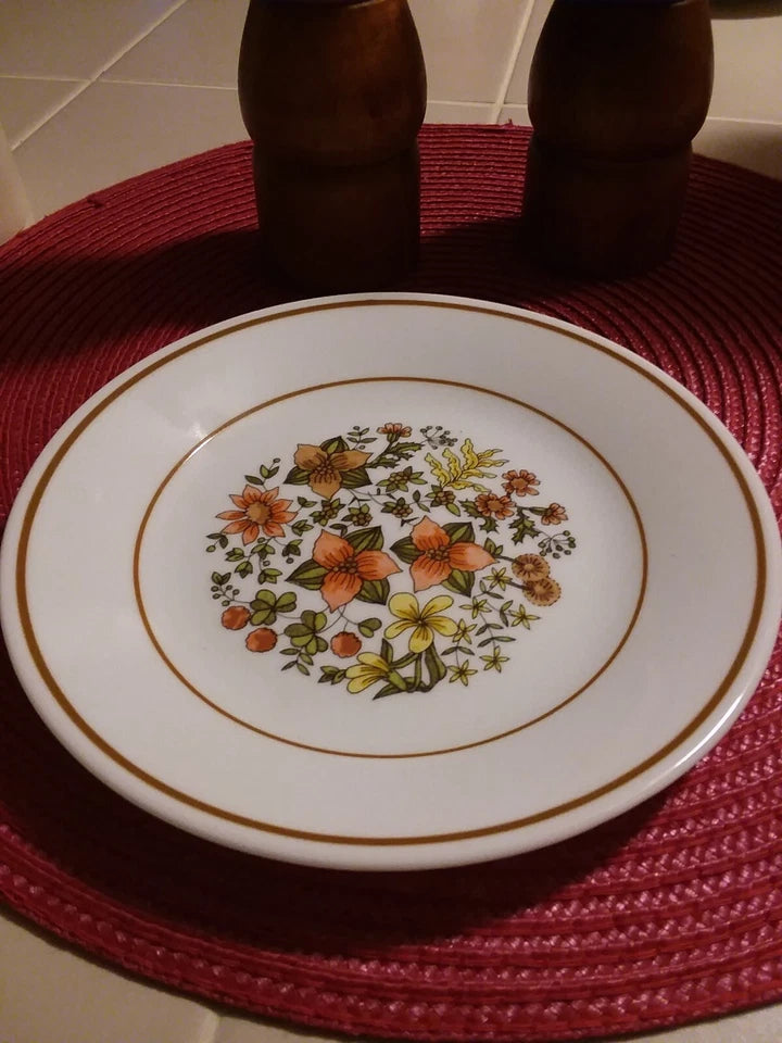 Decorative plate with floral pattern on a red placemat
